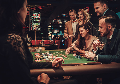 Image of people around a poker table